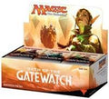 Thirty-six sealed booster packs of Oath of the Gatewatch arranged in a box, showing colorful card pack fronts