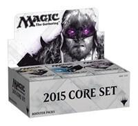 Box of 36 Magic 2015 booster packs with illustrated fantasy card art spilling slightly from the opened top