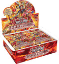 Booster box of trading card packs with fiery volcanic artwork stacked on a tabletop
