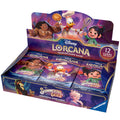 Opened booster box of collectible trading card packs with colorful fantasy artwork spilling out on a wooden table